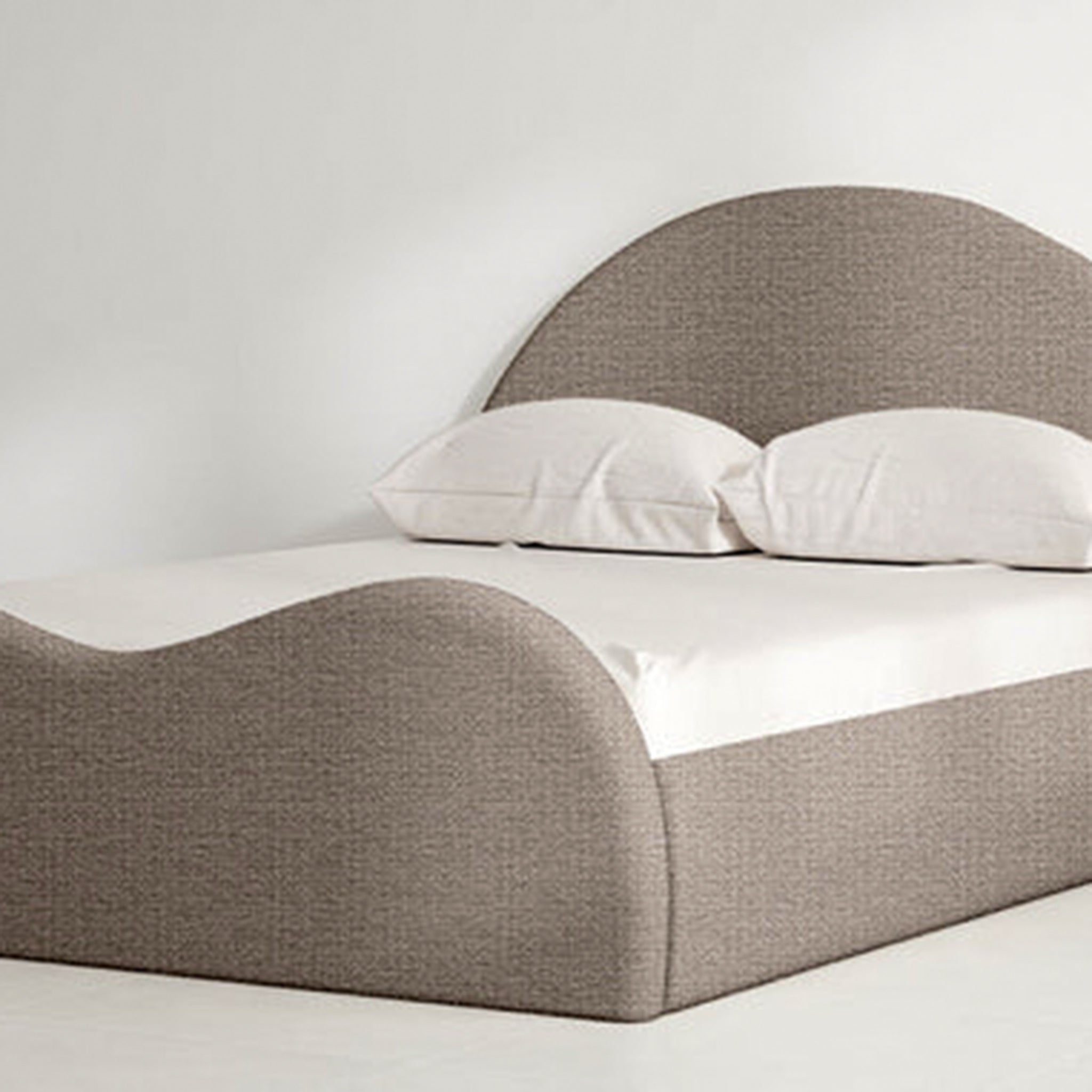 The Dolly Bed in soothing gray, perfect for contemporary decor.
