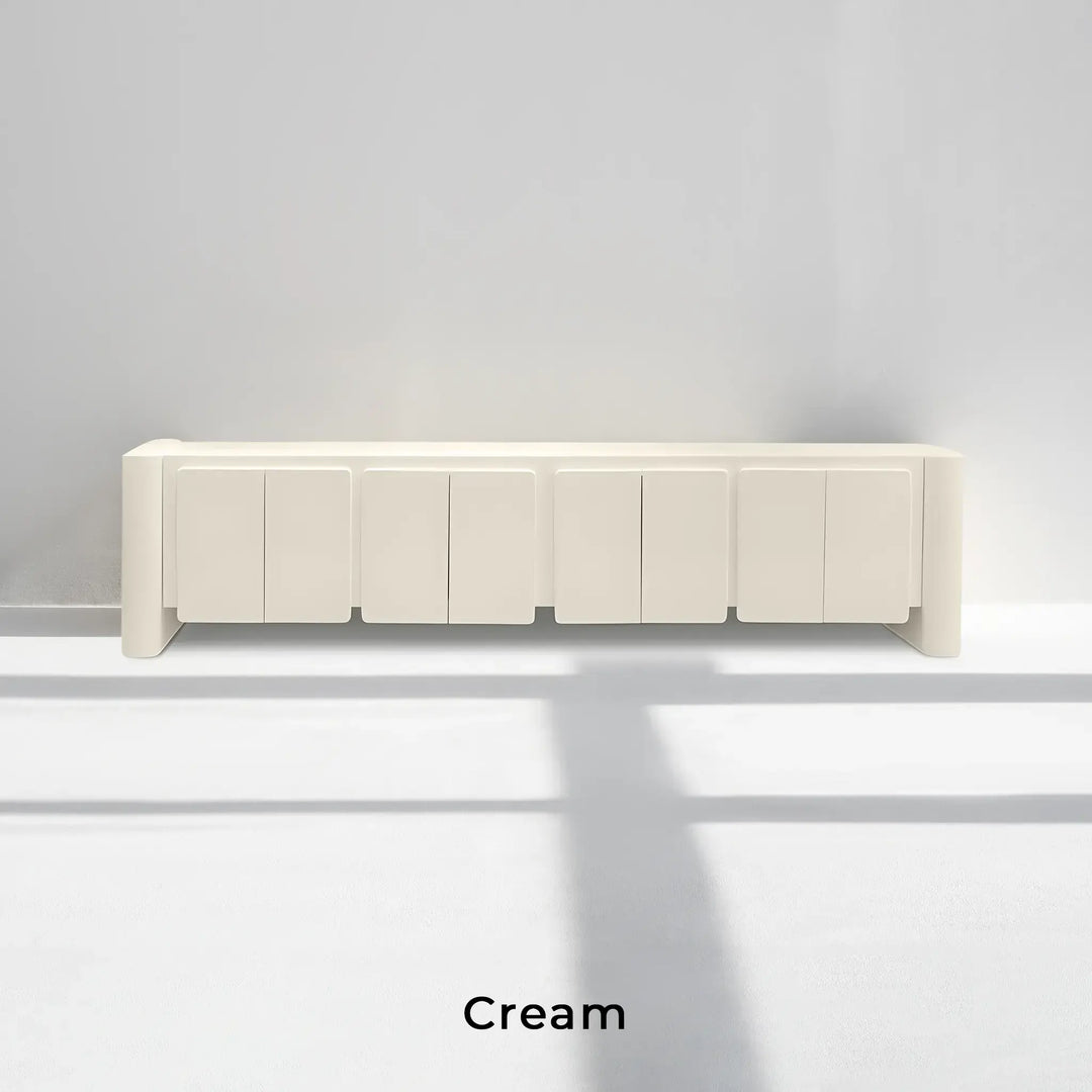 he Dustin cream TV unit styled in a minimalist living room, combining elegance and practicality.