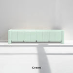 Load image into Gallery viewer, Corner green TV stand in a bright family room, offering functionality and clean lines.

