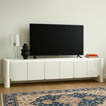 Load image into Gallery viewer, Minimalist white TV stand, crafted for functionality and style in urban homes.
