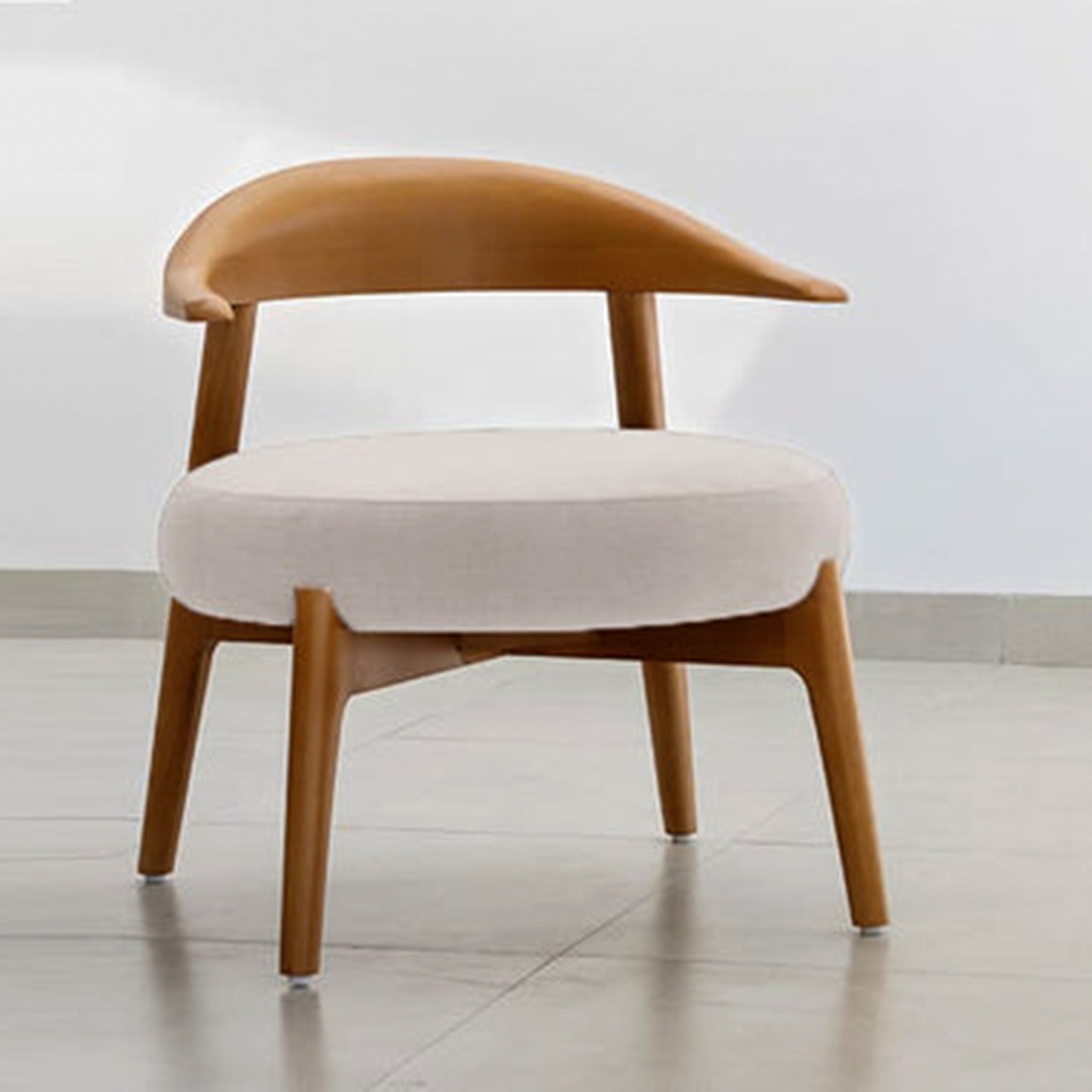 "The Hyde Accent Chair with its unique wooden curves and cozy seat"