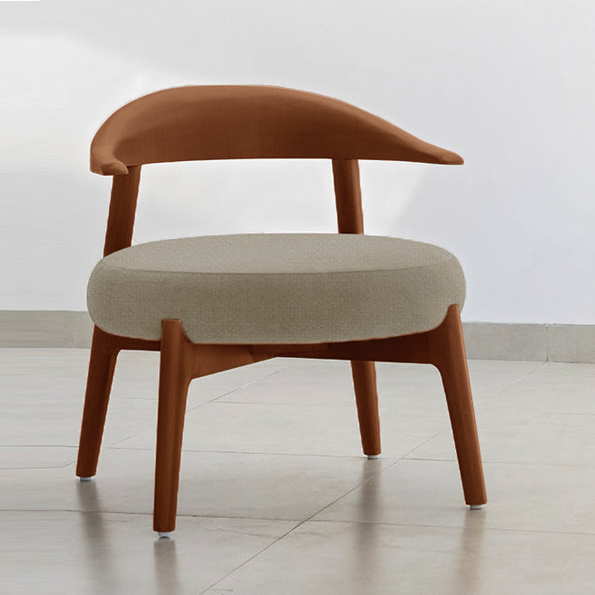 "The Hyde Accent Chair with sleek wooden curves and cozy fabric"