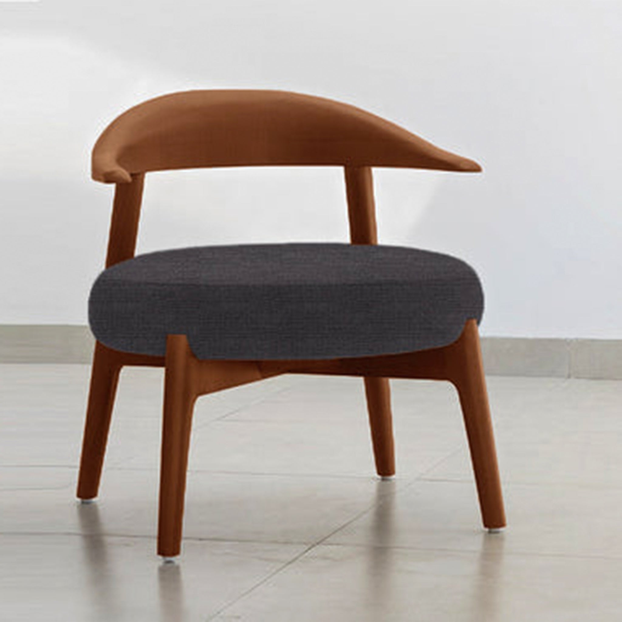 "The Hyde Accent Chair with sleek wooden frame and plush blue seat"