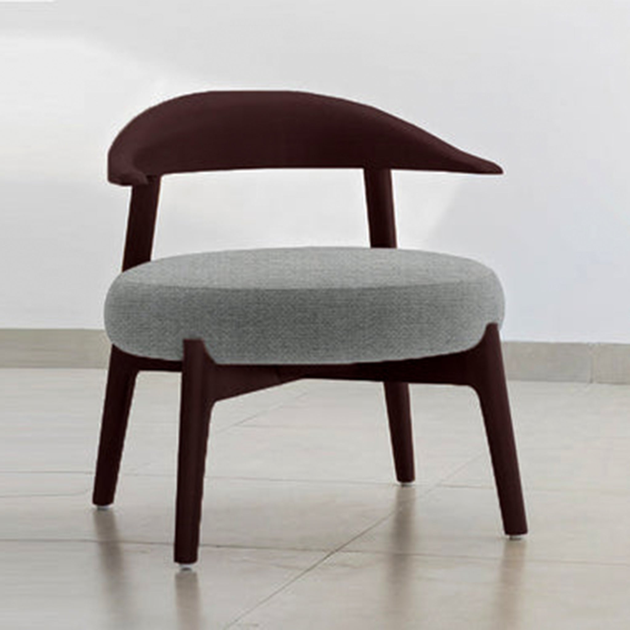 "The Hyde Accent Chair with sleek wooden backrest and cushioned seat"