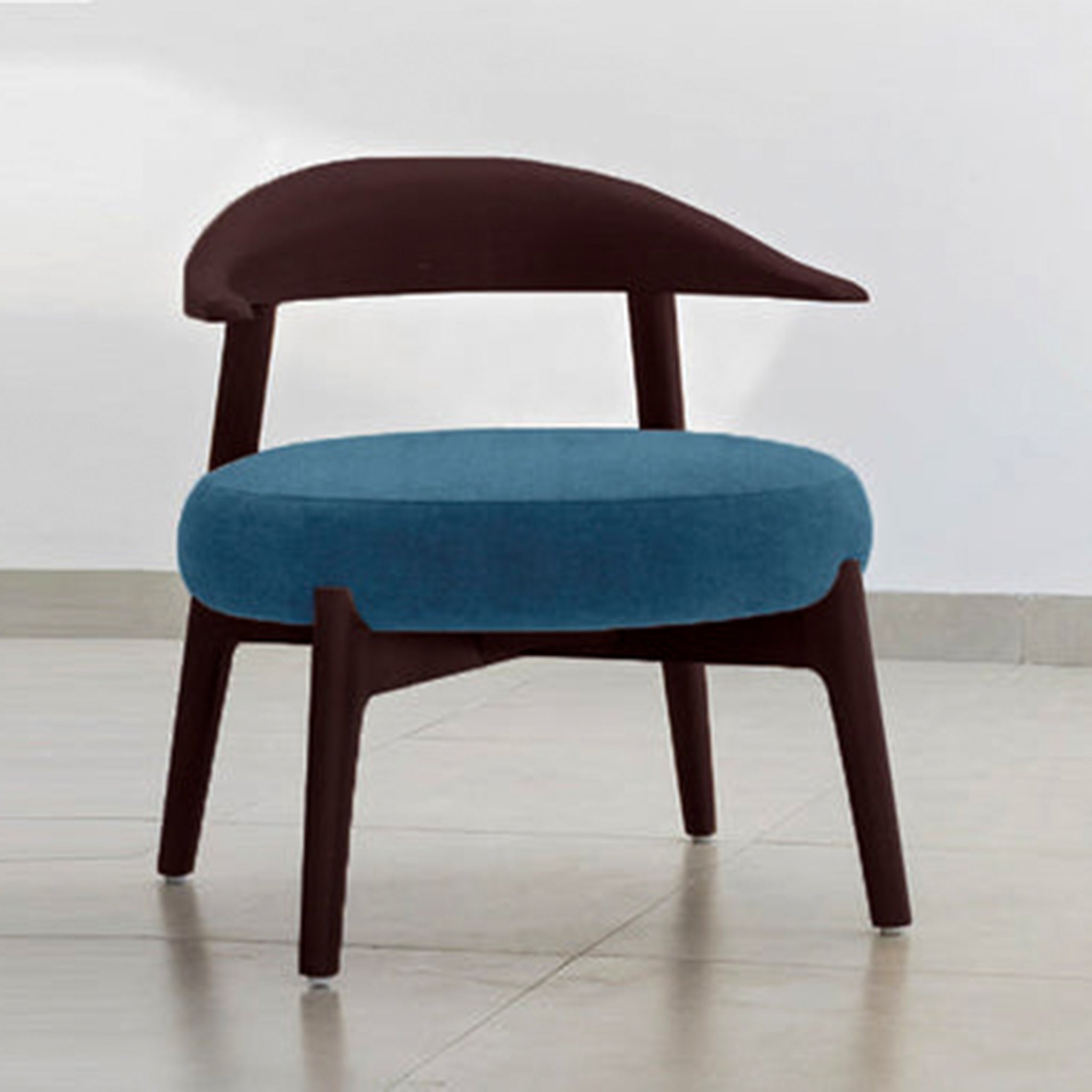 "The Hyde Accent Chair with unique wooden curves and comfortable fabric"