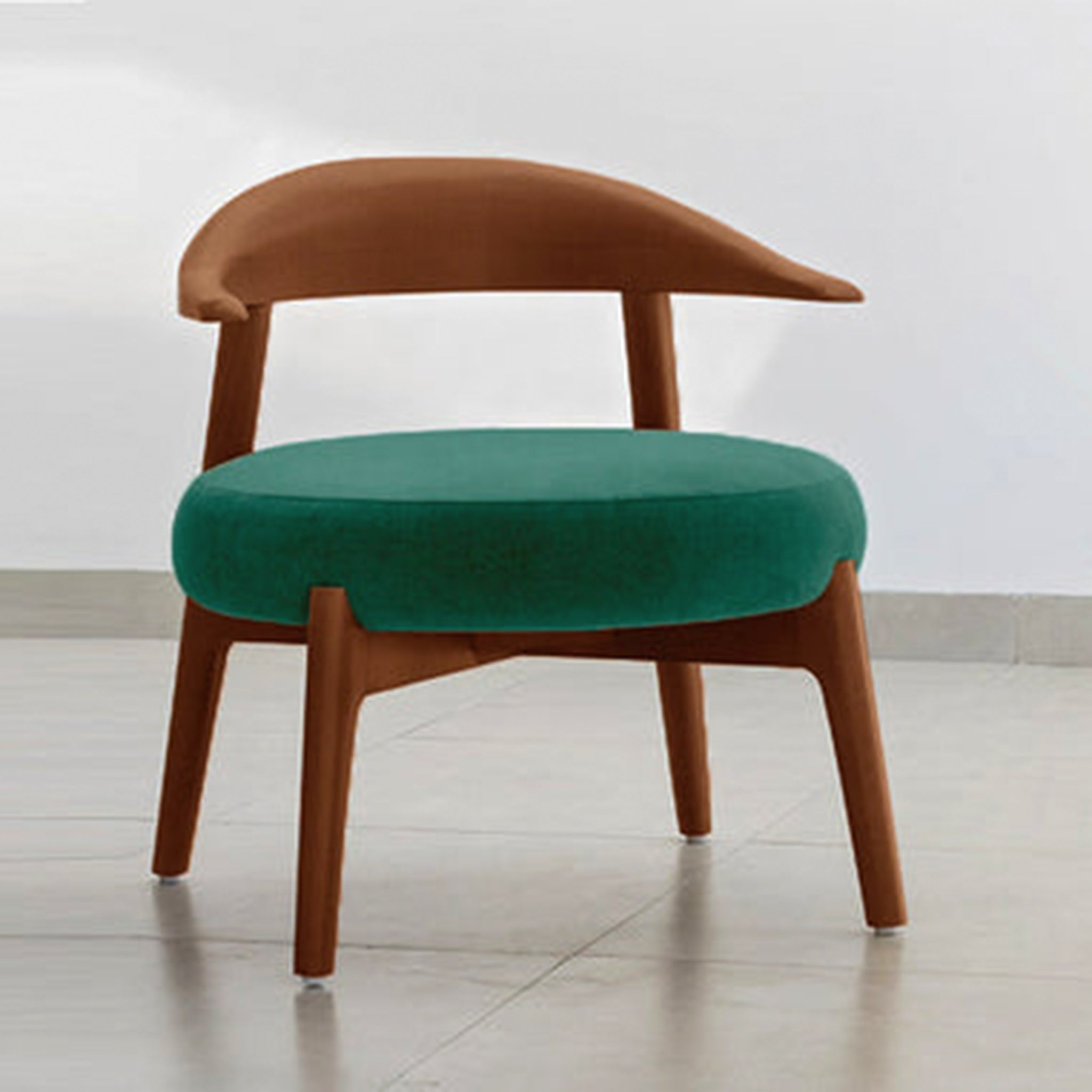 "The Hyde Accent Chair with a sleek wooden frame and plush seating"