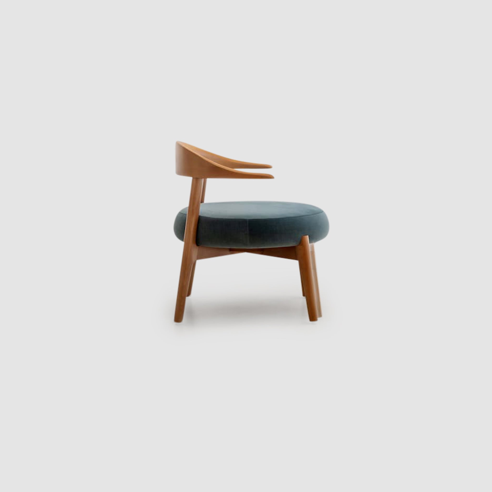 "Modern Hyde Accent Chair featuring a curved wooden backrest and cushioned seat"