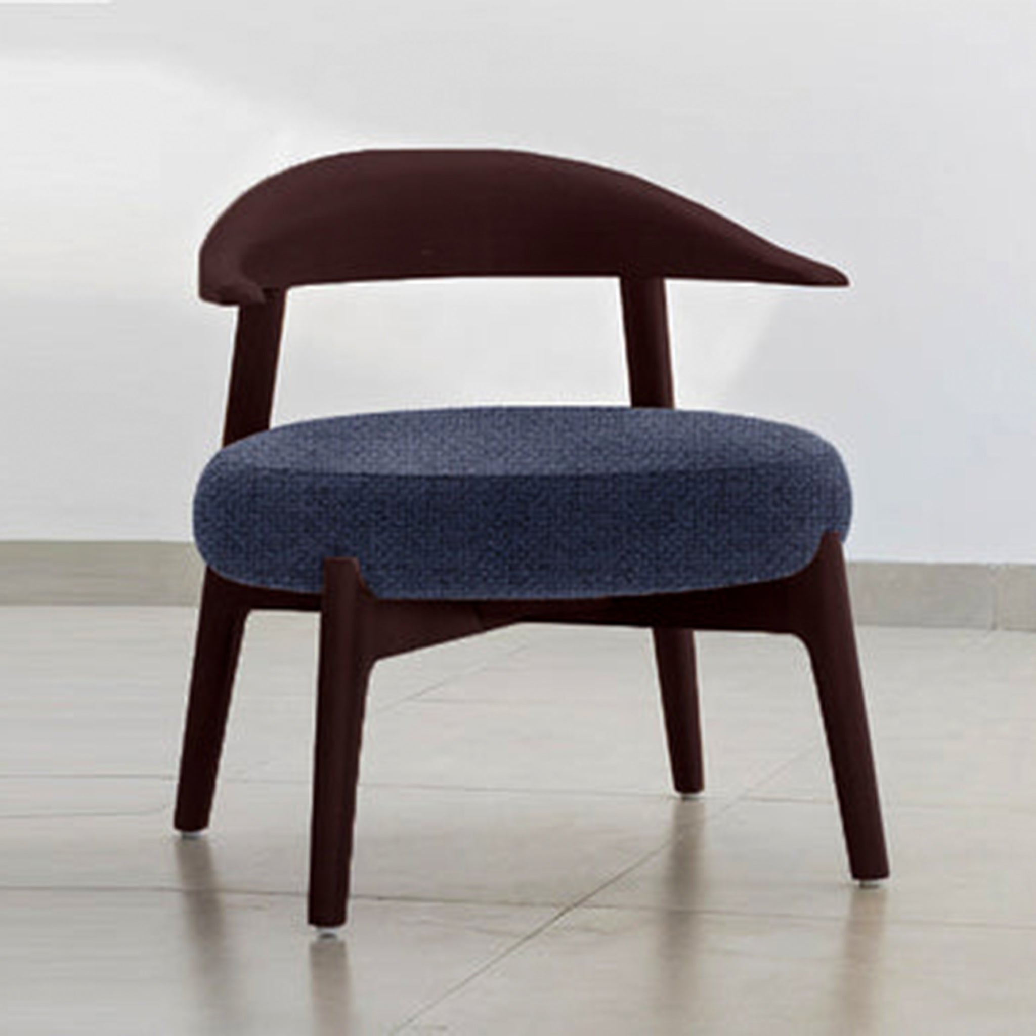 "The Hyde Accent Chair with unique wooden curves and comfortable seat"