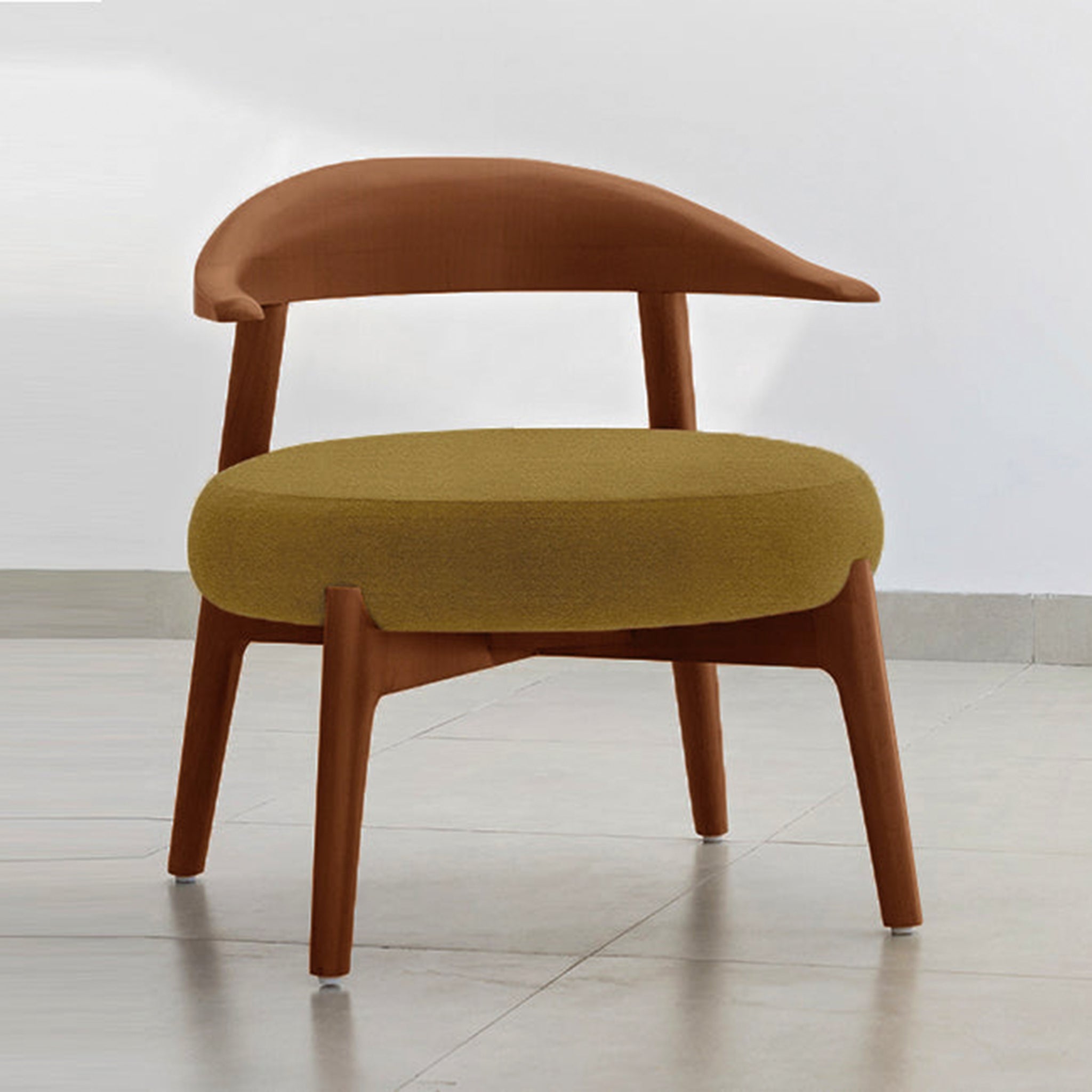"The Hyde Accent Chair with a sleek wooden frame and comfortable upholstery"