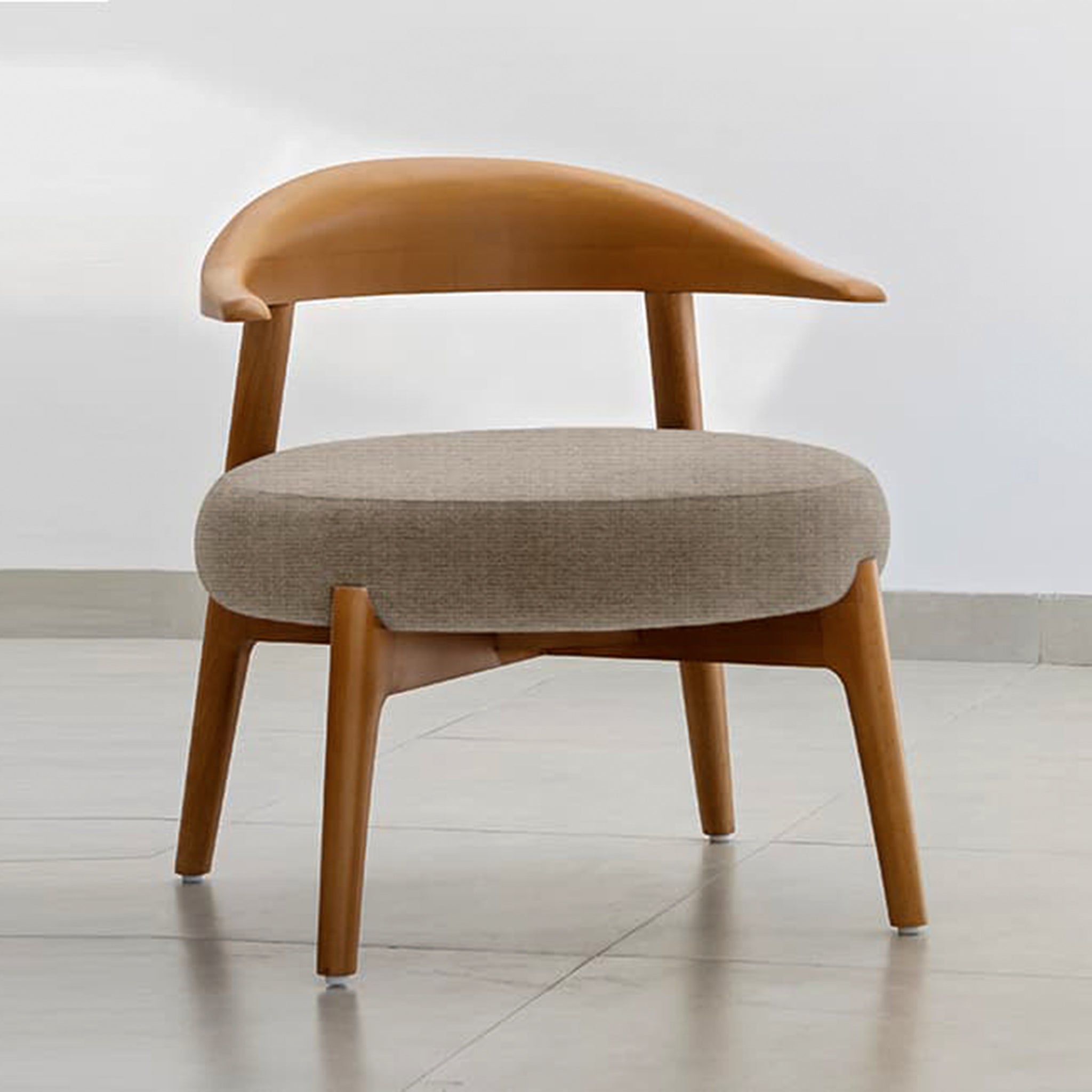 "The Hyde Accent Chair with sleek wooden design and cozy seat"