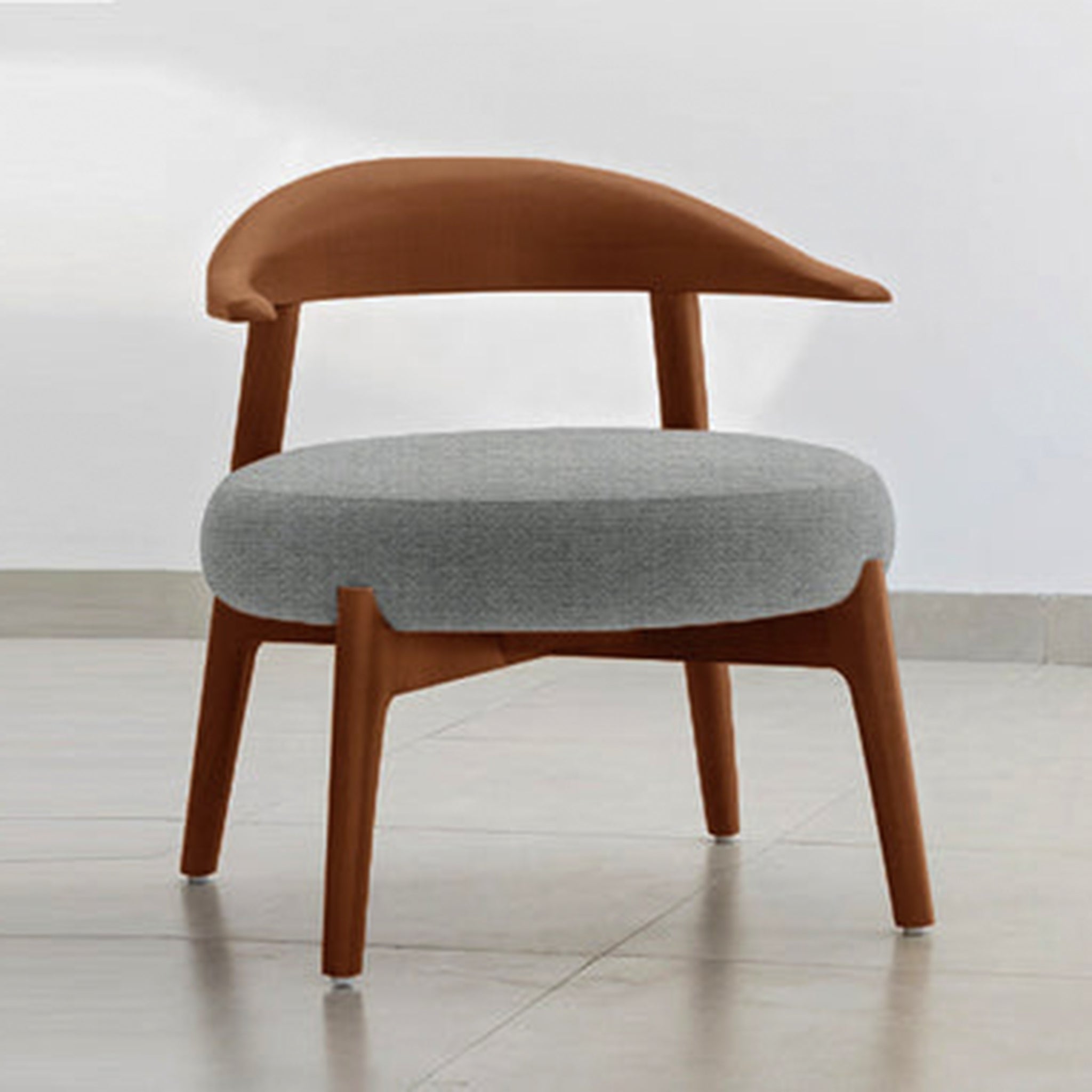 "The Hyde Accent Chair with unique wooden frame and comfortable fabric"