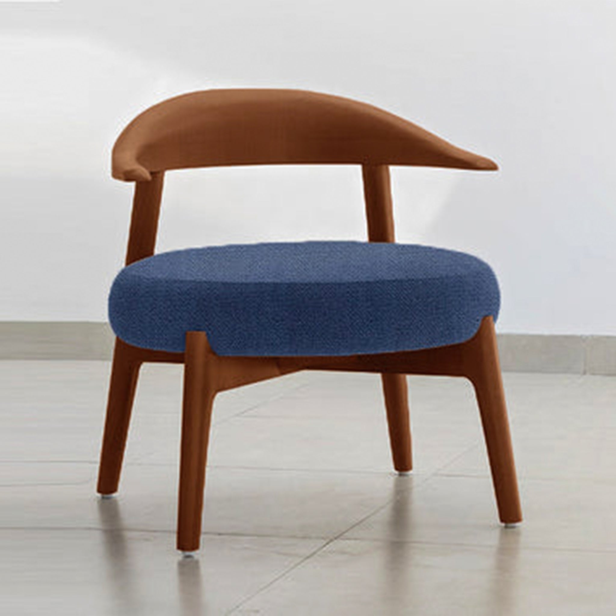 "The Hyde Accent Chair with unique wooden curves and comfortable seating"