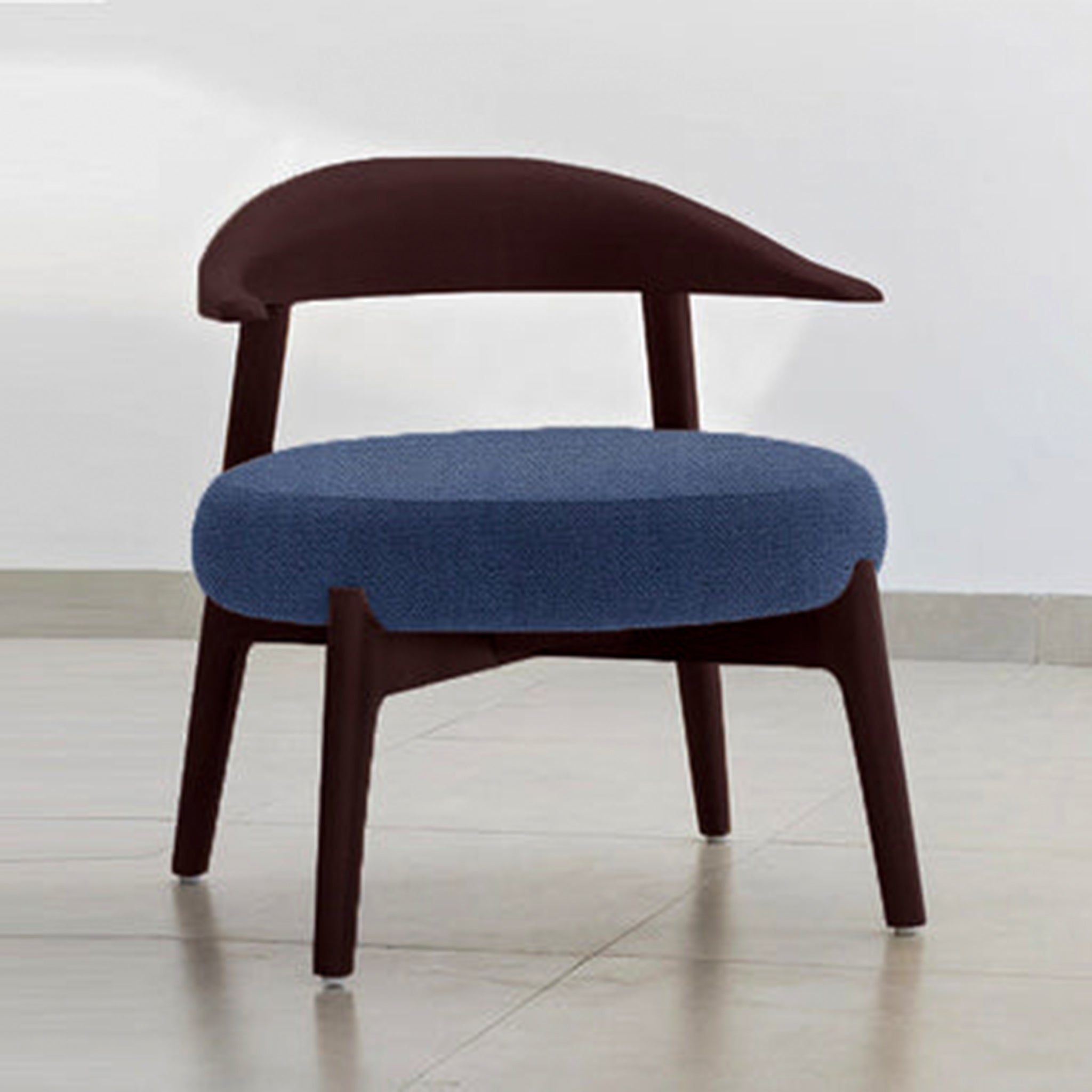 "The Hyde Accent Chair with sleek wooden design and comfortable fabric"