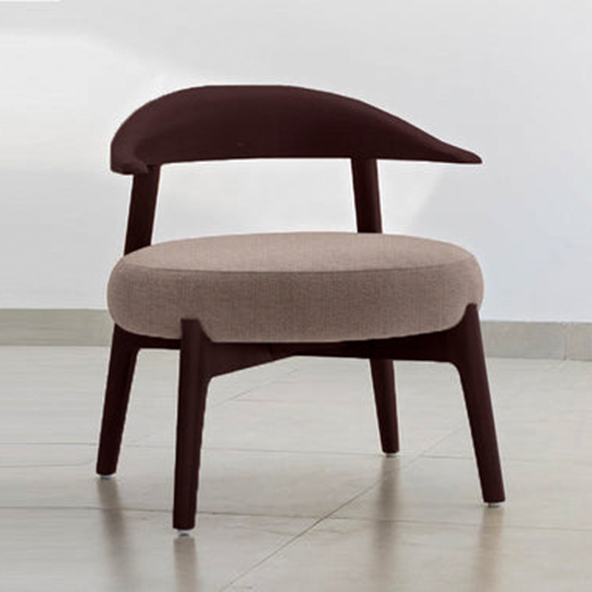 "The Hyde Accent Chair with its unique wooden curves and soft seat"