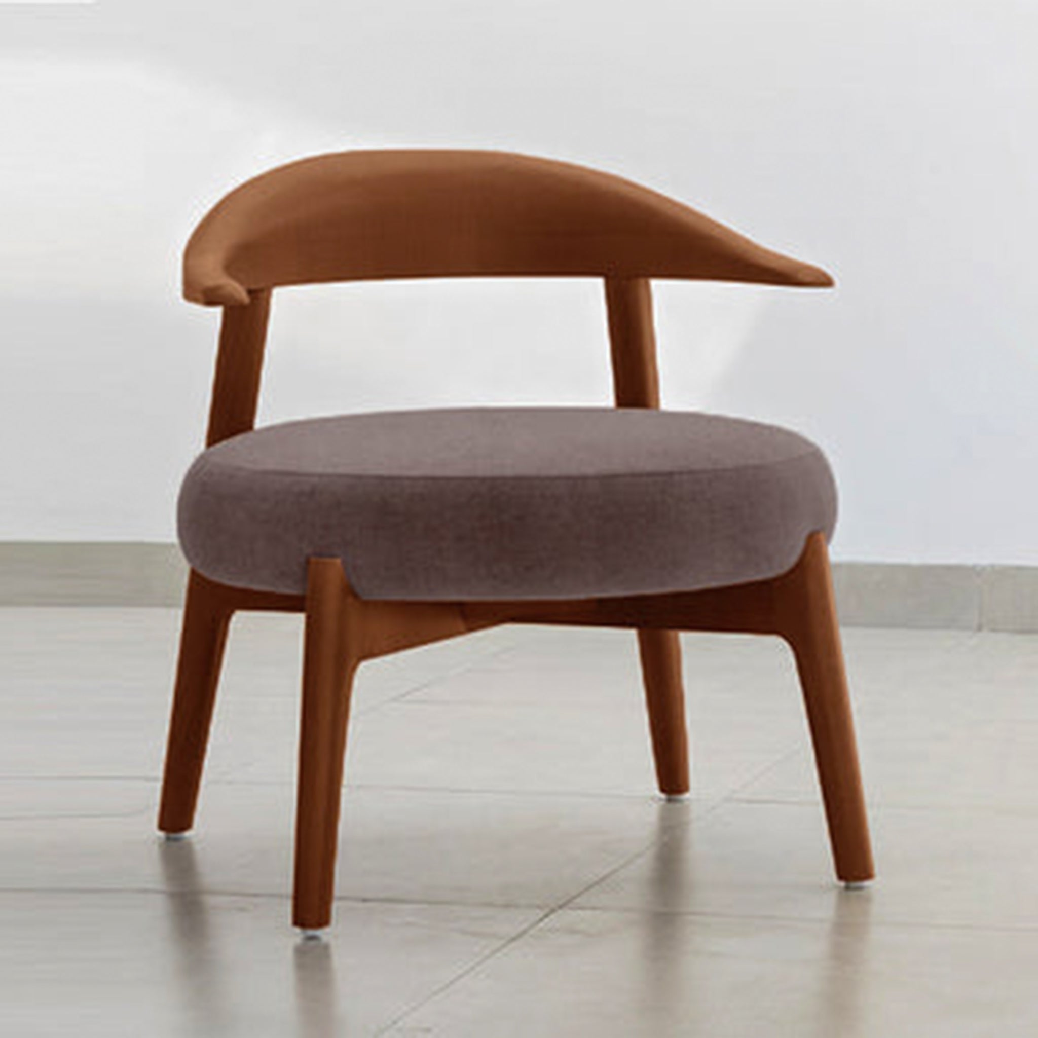 "The Hyde Accent Chair with unique wooden curves and comfortable fabric"