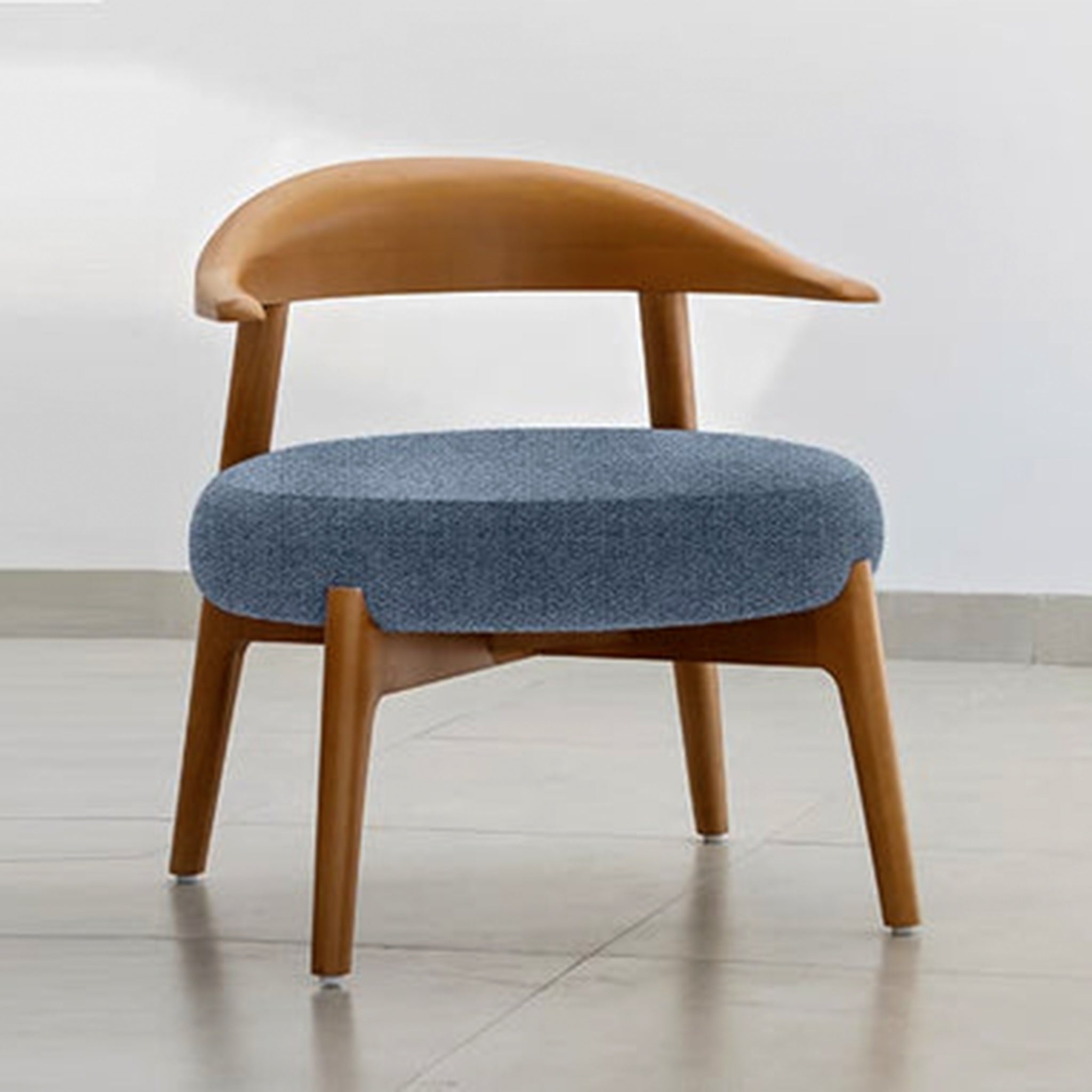 "The Hyde Accent Chair's mid-century design with modern comfort"