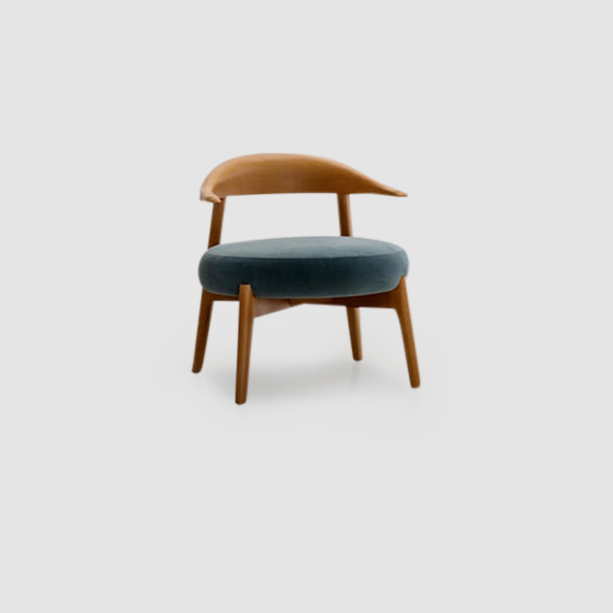 "The Hyde Accent Chair with sleek wooden curves and plush blue seat"
