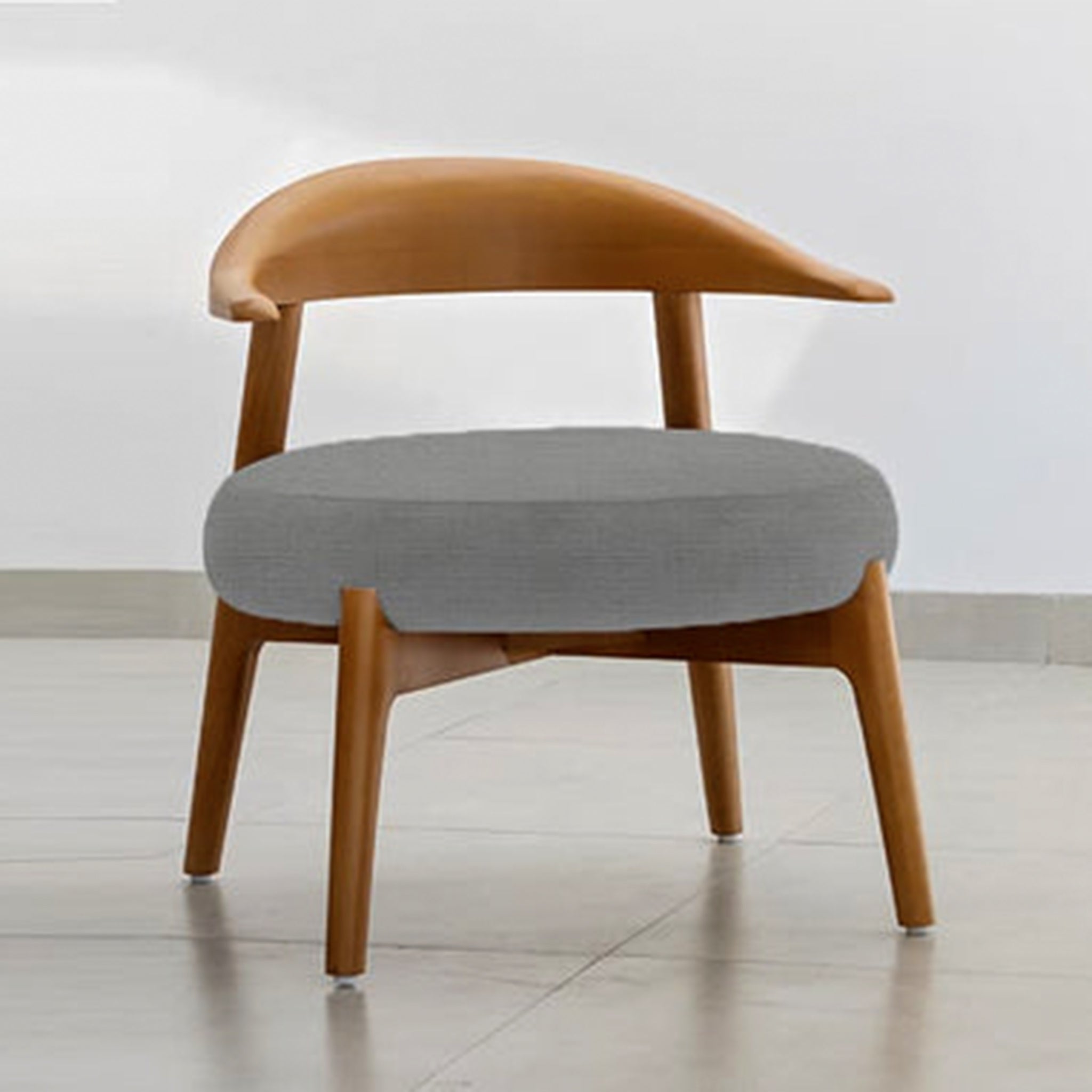 "The Hyde Wood Accent Chair's curved wooden back and plush seating"