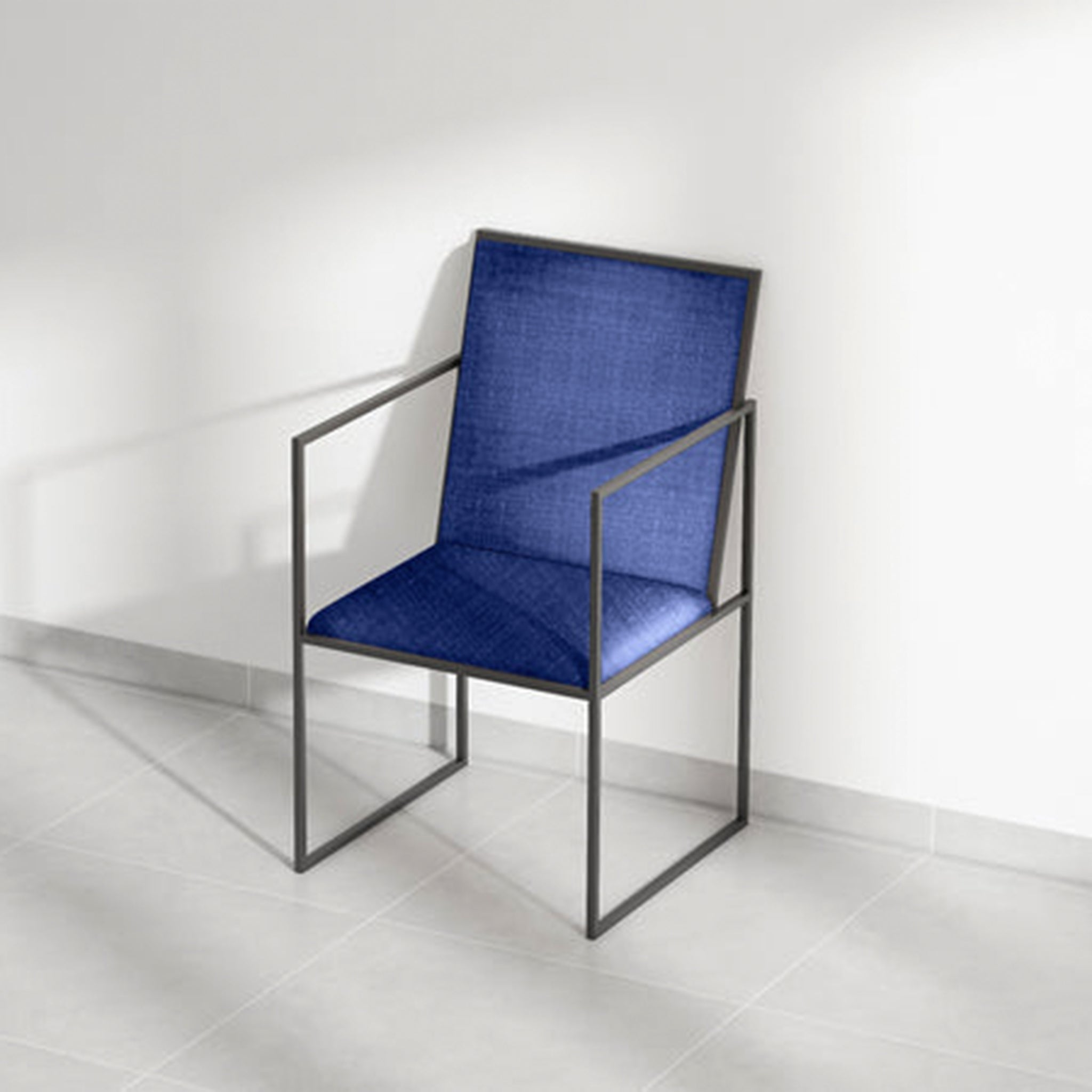 Blue cushioned dining chair with black metal frame