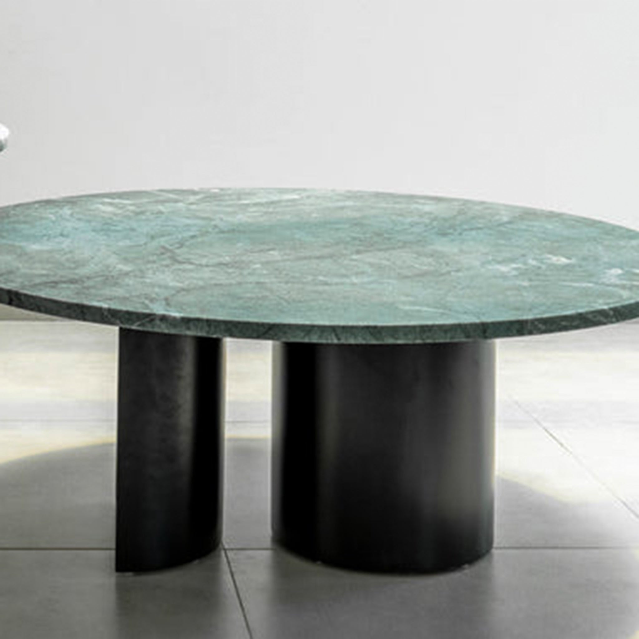 Honed Marble Table: Silky smooth finish adds elegance to any living space.