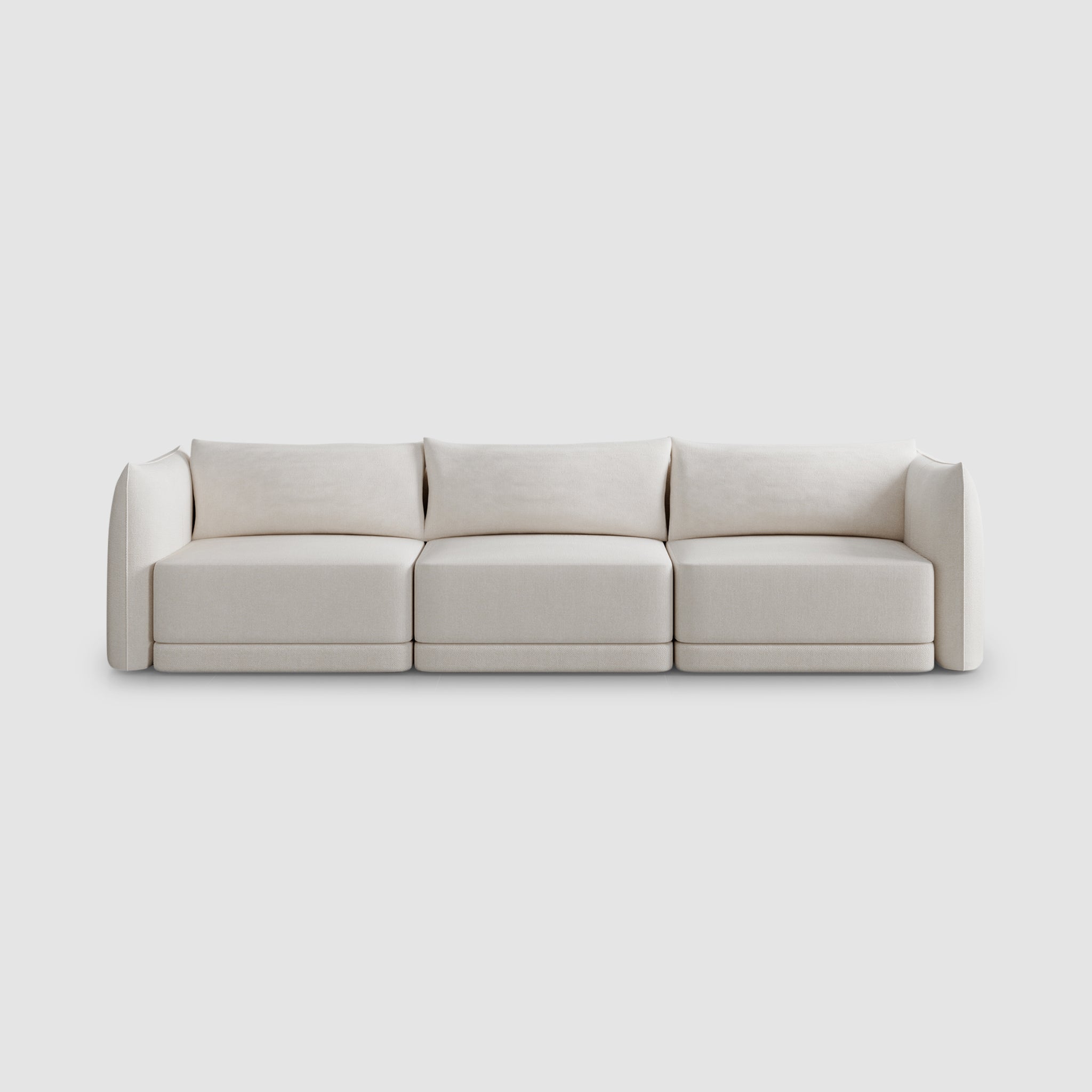Elegant white three-seater sofa with a minimalist design, perfect for modern living room interiors.