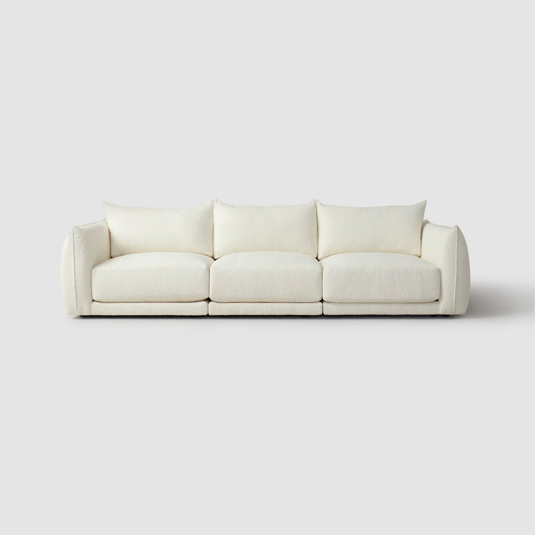 Front view of The Jules Sofa in white fabric - deep seat corner sofa front view