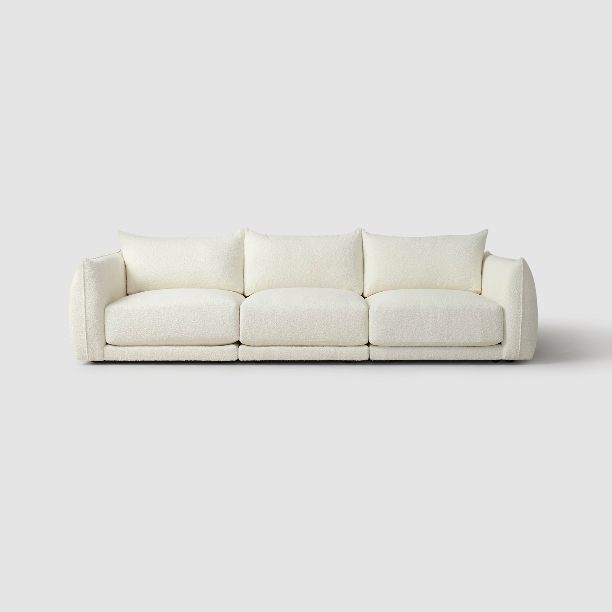 Front view of The Jules Sofa in white fabric