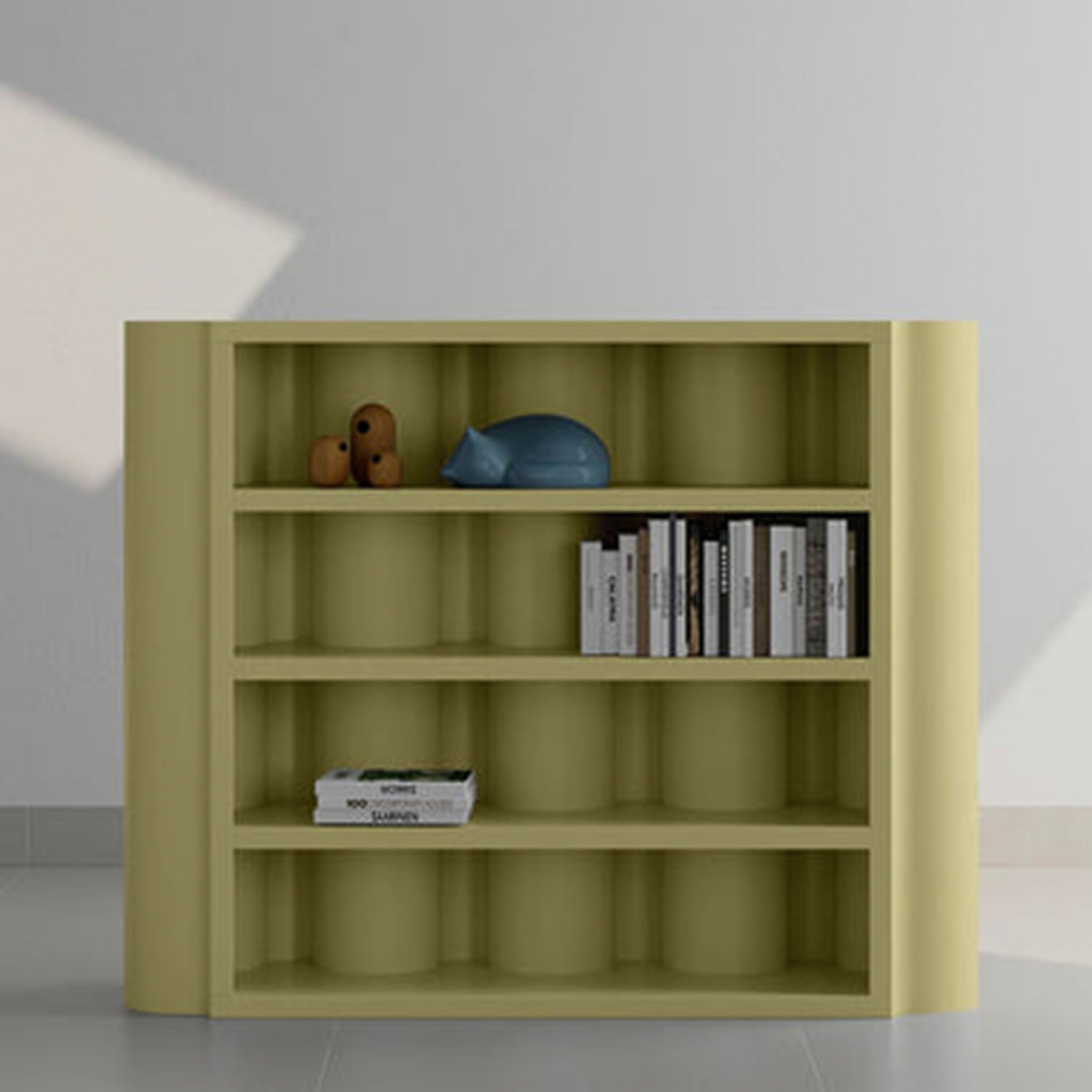 A modern yellow bookcase with curved edges, featuring several books and decorative items on its shelves.