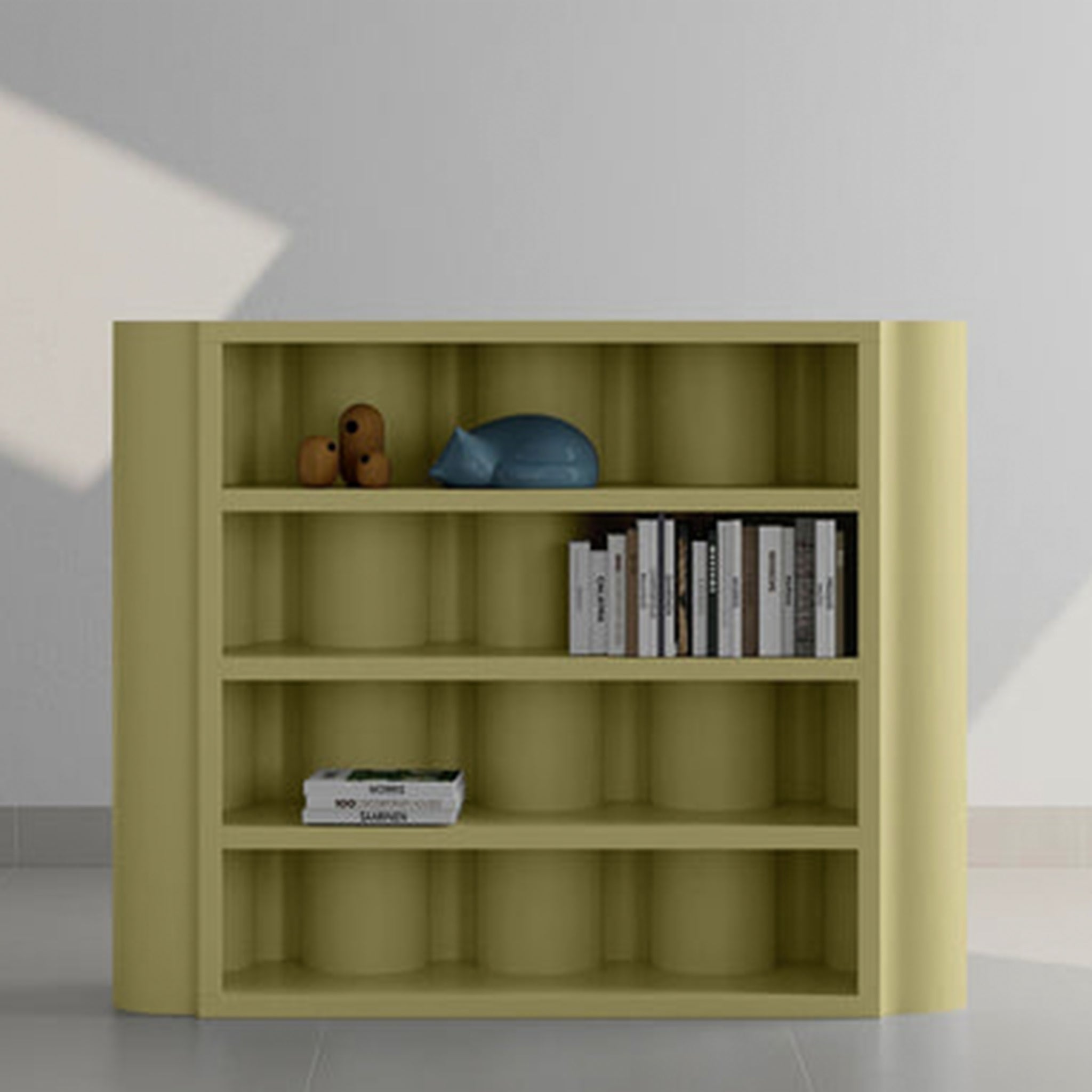 A stylish yellow bookcase with rounded edges, displaying a collection of books and decorative items on its shelves.