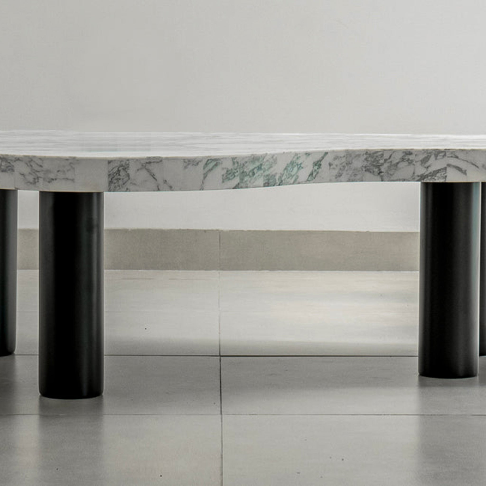 Unique Marble Top: Natural variations ensure every Peggy table is one-of-a-kind. 