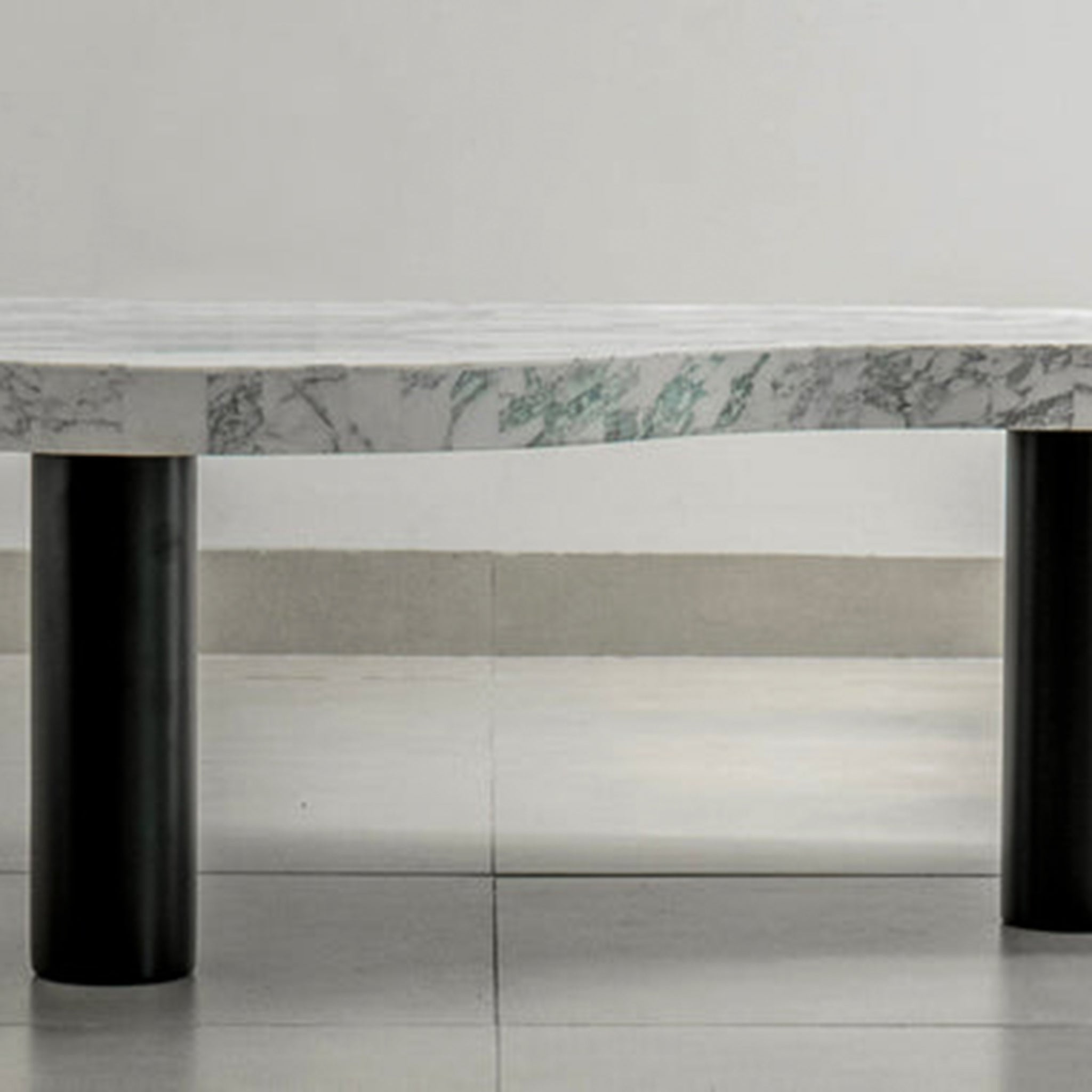 Statement Coffee Table: The Peggy Table's natural marble draws attention in any space.