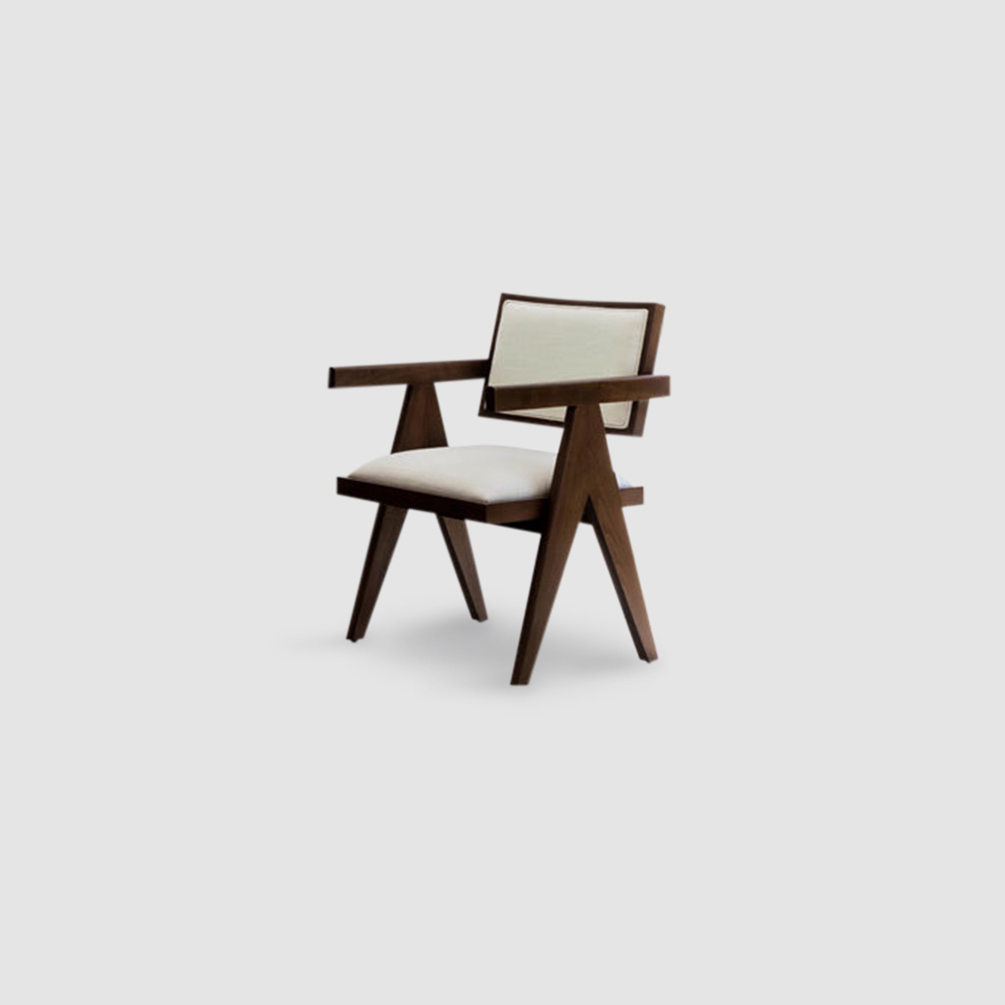 "The Pierre Dining Chair with beige cushions and a wooden structure."