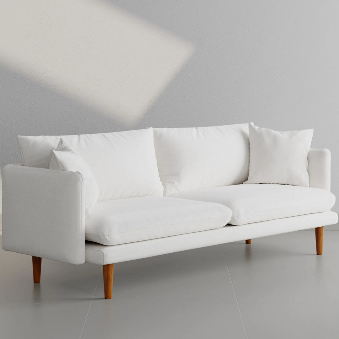 Sophisticated premium sofa in a spacious living room, offering both style and functionality.