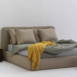 Load image into Gallery viewer, The Ruby Bed - Fully upholstered with two bolster pillows and three oversized feather-filled cushions, offering ultimate comfort and elegance. Perfect for modern bedrooms with a sleek frame design. Ideal for master and guest bedrooms. Dimensions: 187 cm W x 227 cm L, 35 cm height. Mattress and bedding not included. Bed buy dubai online
