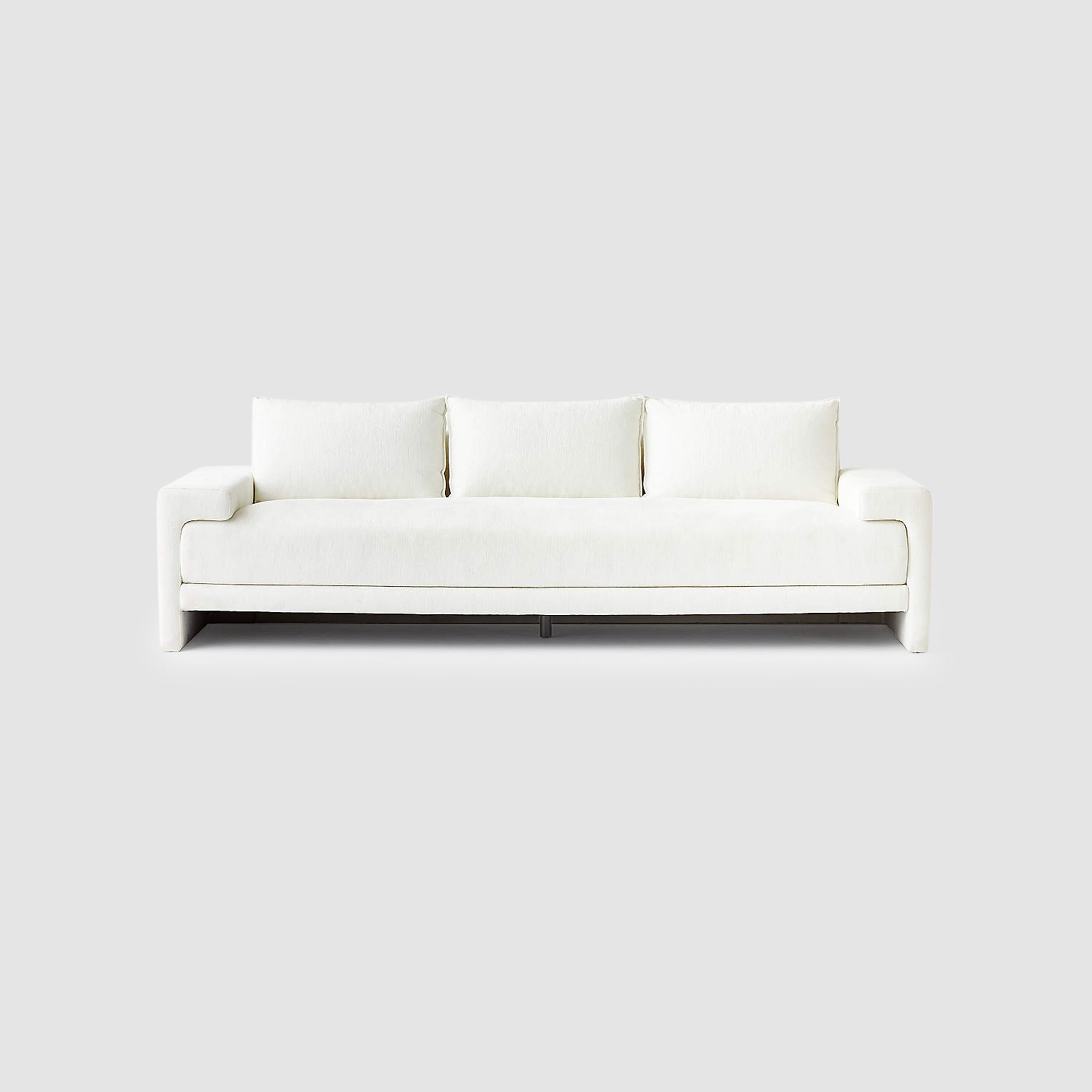 Modern white sofa with clean lines and plush cushions, front view - perfect for contemporary living rooms and minimalist interior -Buy Modern Sofas in Dubaidesign.