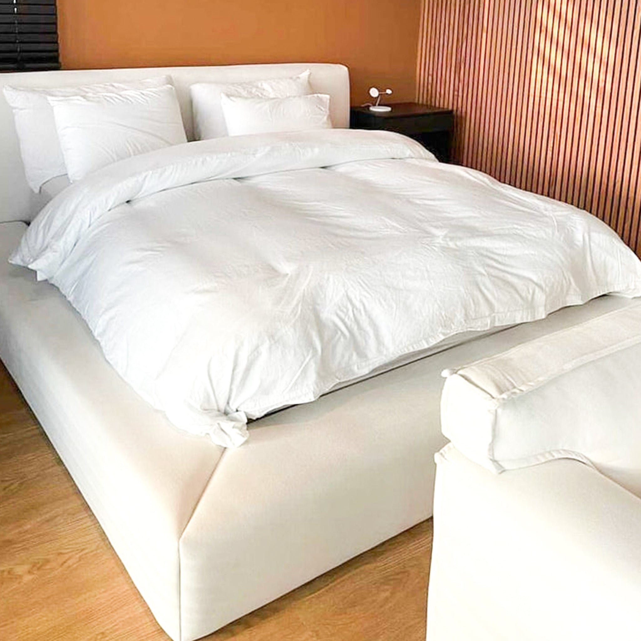 Minimalist Stella Bed in stain-resistant fabric. Easy care platform bed for a peaceful retreat.
