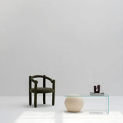 The Stewy black accent chair paired with a chic coffee table, enhancing the elegance of a modern home.