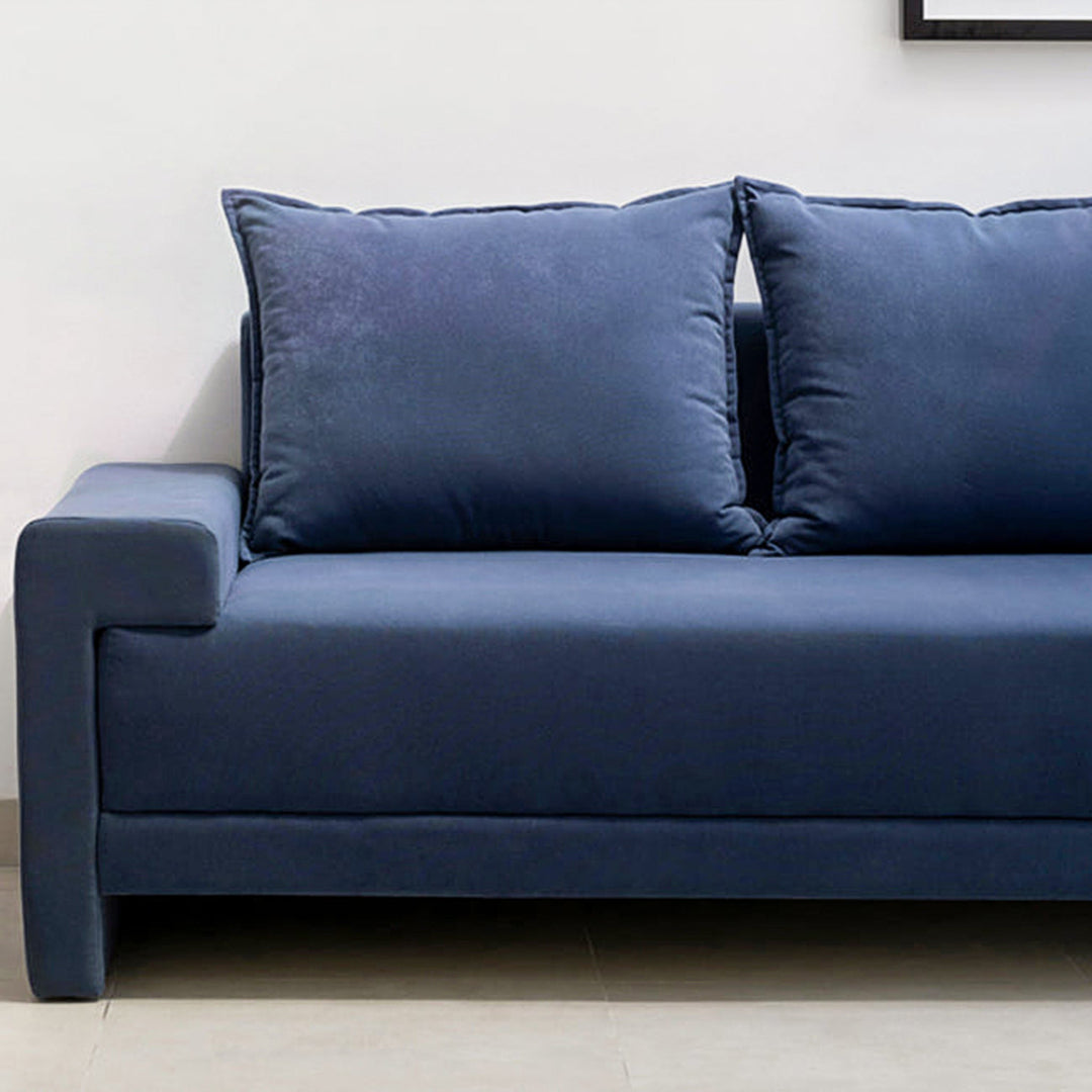 The Sylvia modern white sofa styled in a bright and spacious living room, offering timeless appeal.