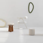 Load image into Gallery viewer, Modern white dining chair paired with a sleek wooden table, creating a cozy dining space.
