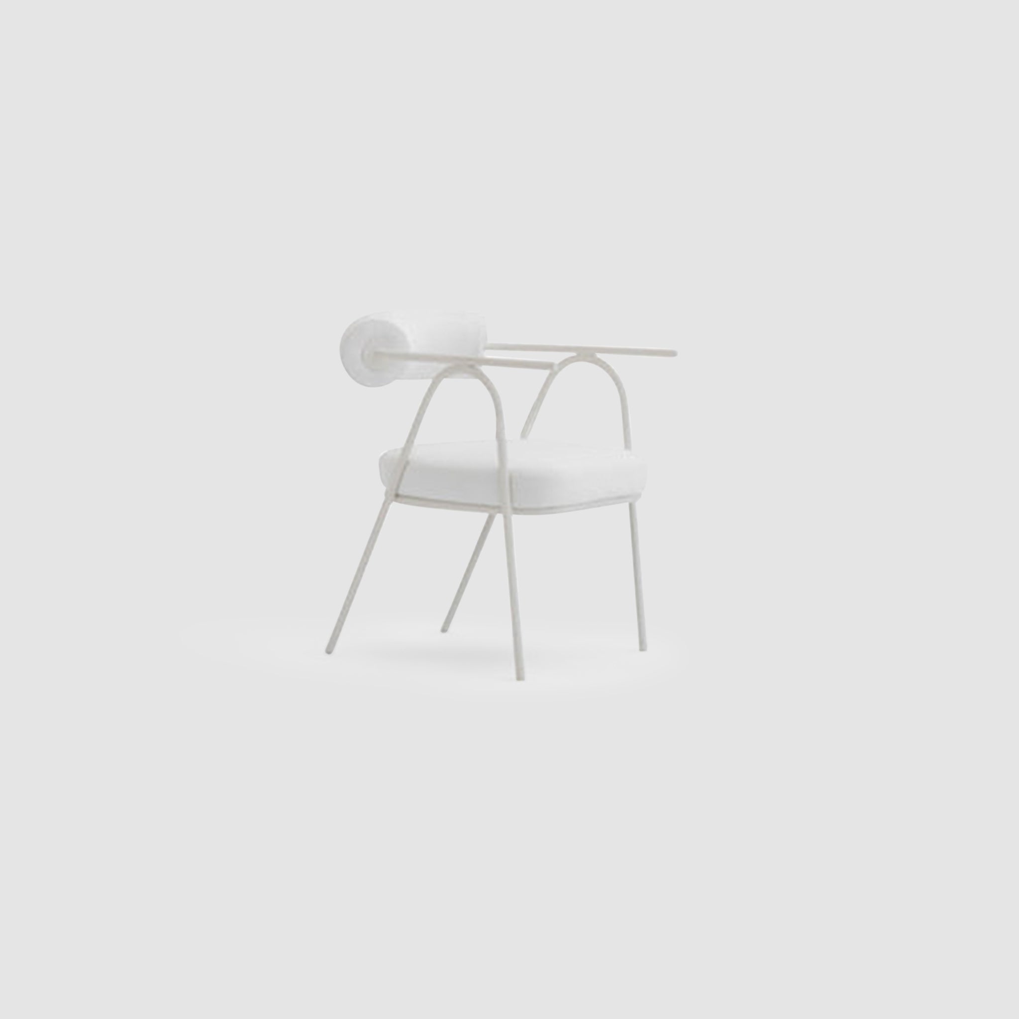 The Wanda Dining Chair featuring a modern minimalist design with a white metal frame, padded seat, and cylindrical backrest, offering a stylish and comfortable seating option.