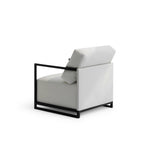 Load image into Gallery viewer, Angled view of The Wyth affordable Outdoor Accent Chair featuring white cushions and a sleek black metal frame, set against a plain background.
