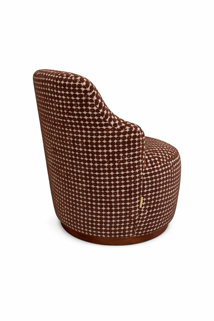 The Aram Swivel Chair