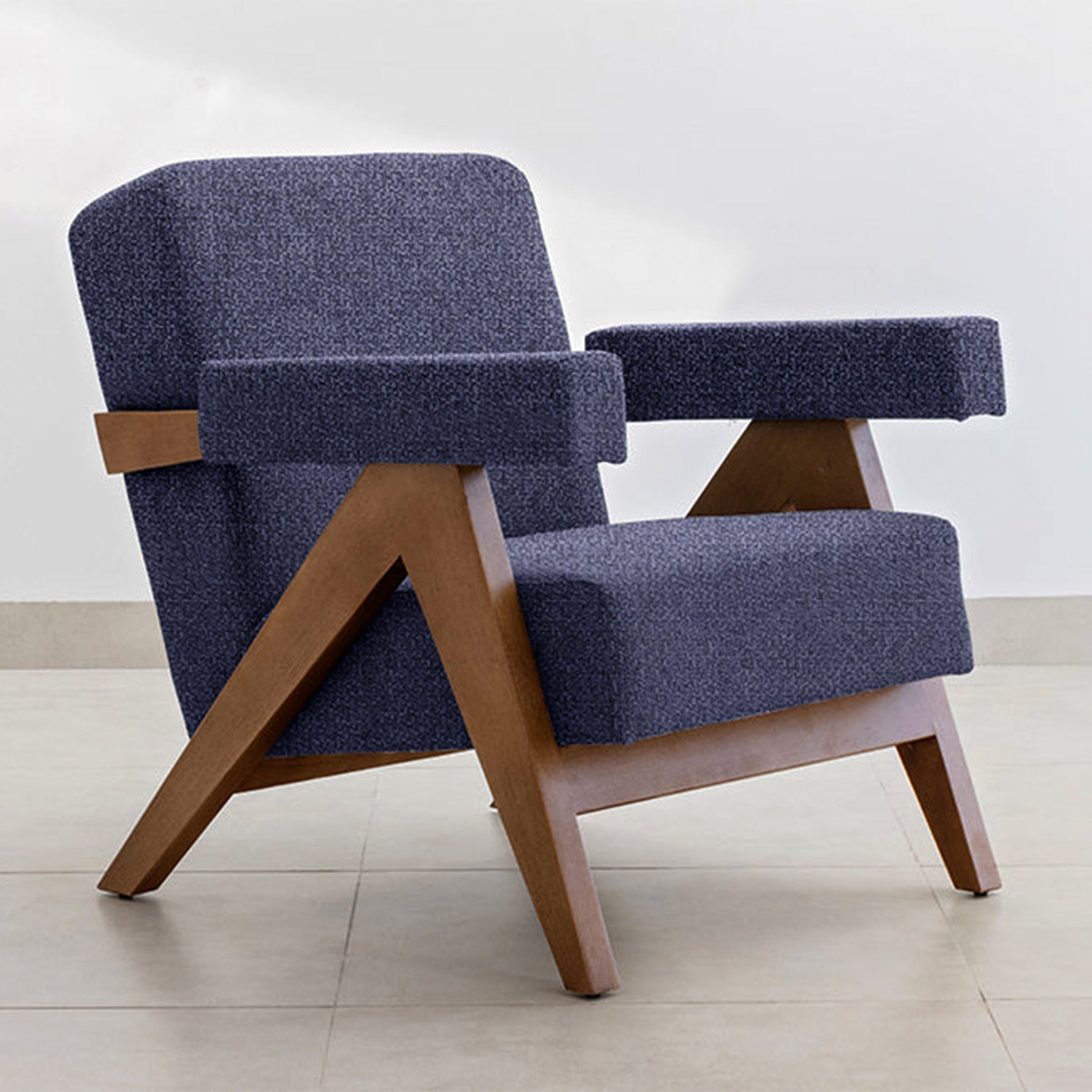Stylish and elegant The Pierre Accent Chair featuring teal fabric and wood