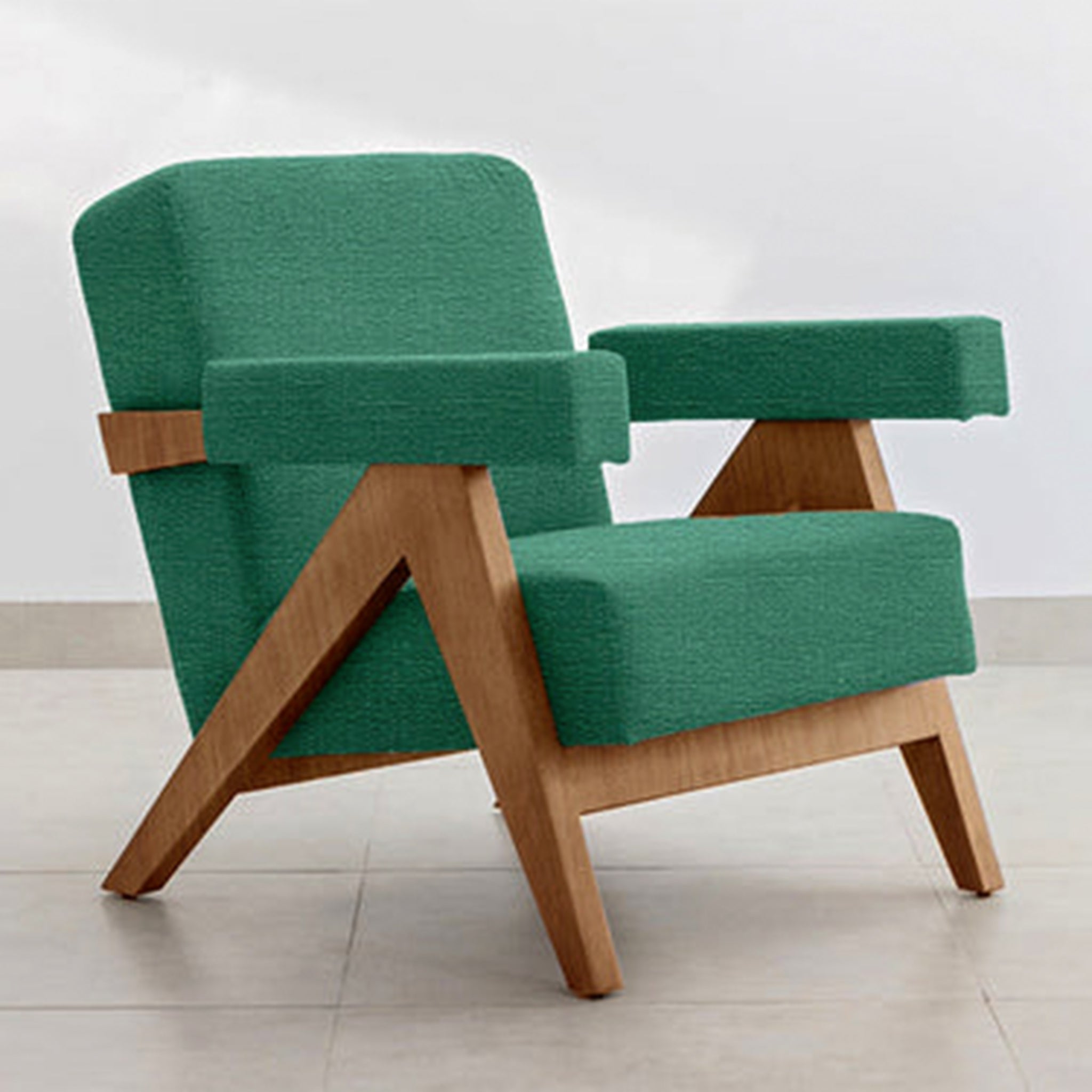 Elegant and chic The Pierre Accent Chair with a teal finish.