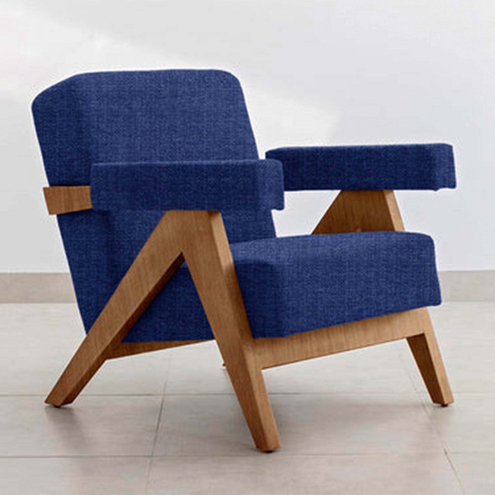 Modern design The Pierre Accent Chair with teal upholstery.