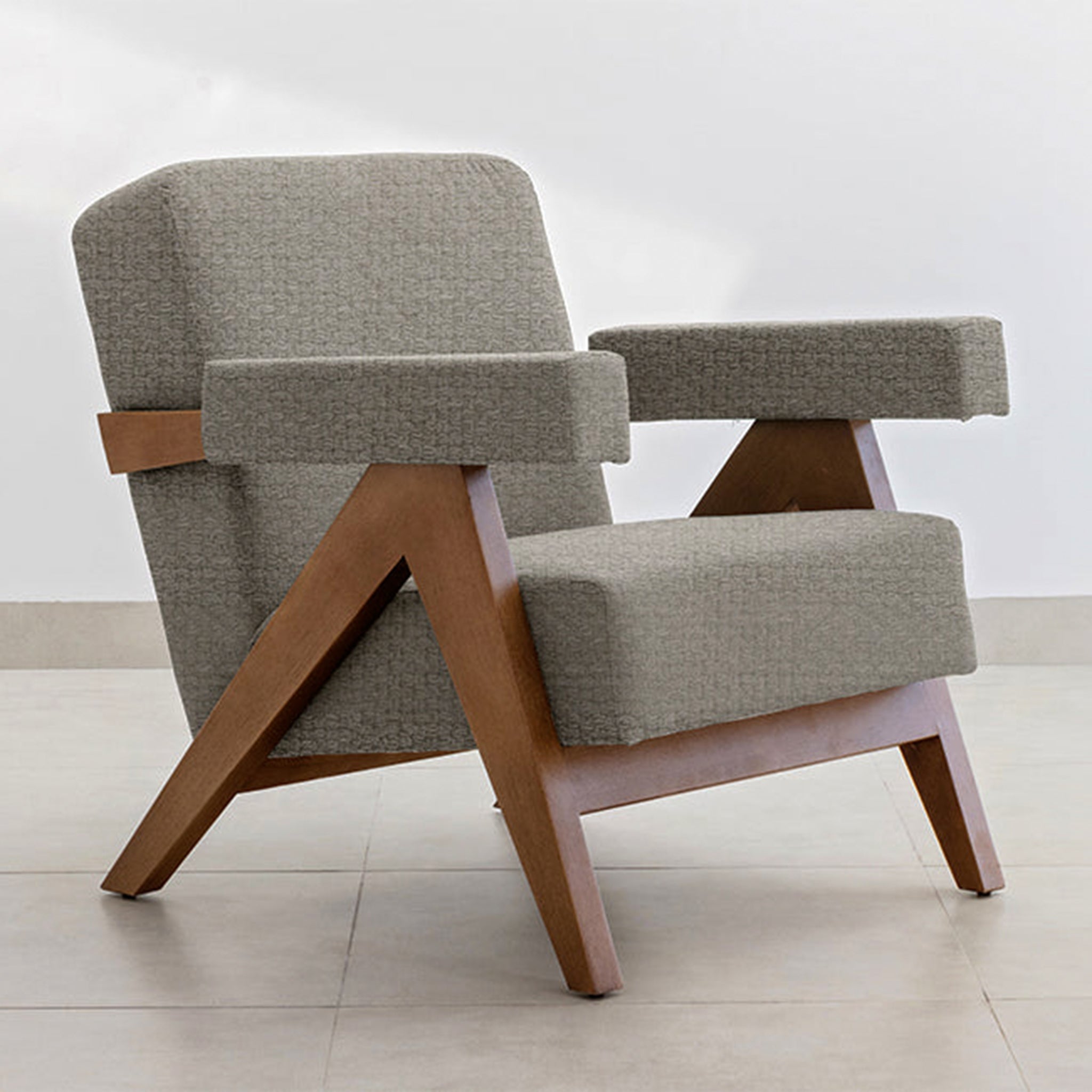 "Comfortable and elegant The Pierre Accent Chair with a wooden frame."