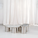 Load image into Gallery viewer, The Willow Chrome Coffee Table With Small Gestures complements contemporary interiors, offering both elegance and practicality.
