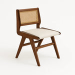 Load image into Gallery viewer, Comfortable black dining chair with a streamlined design, ideal for both casual and formal settings.
