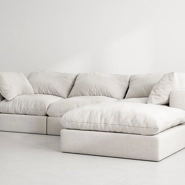 The Avis Feather Cloud Couch in a trendy L shape design, adding charm to any Dubai home.