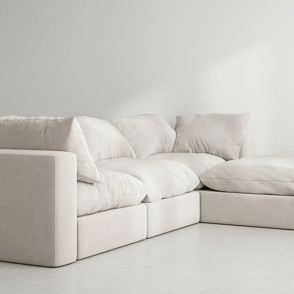 The Avis Feather Cloud Couch as a 4 seater L shape sofa with ottoman, ideal for large families.